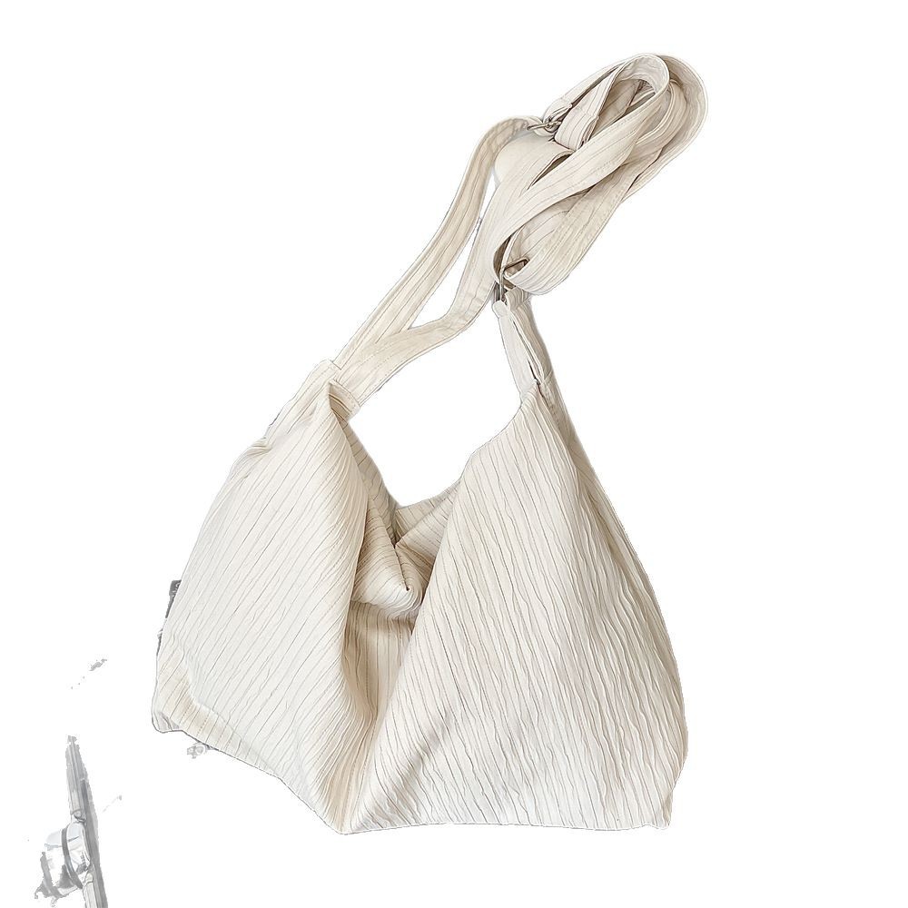 53182 Korean niche canvas bag for women, 2025 New large-capacity commuter crossbody bag, adjustable single-shoulder bag Item Picture