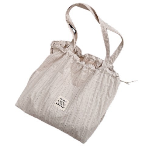 New 4941 striped drawstring single-shoulder bag, laid-back style tote fabric bag, large capacity commuter bag, student class bag Item Picture