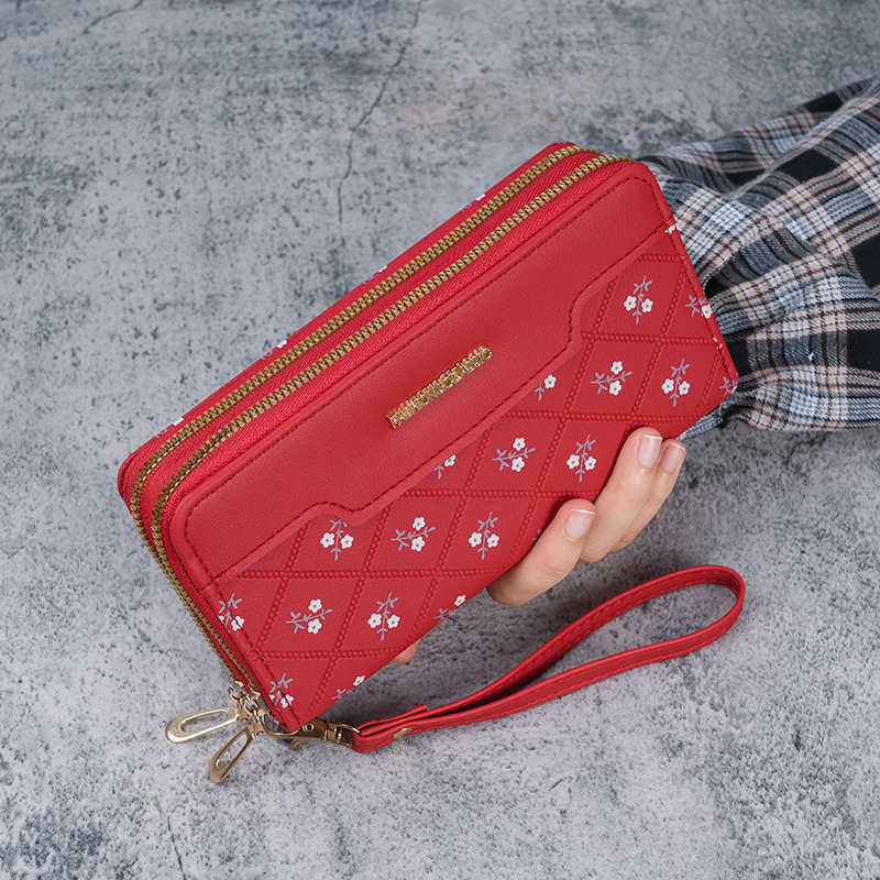 A new long Korean-style simple and spliced hand-held bag for girls, a wallet with a feminine touch full figure
