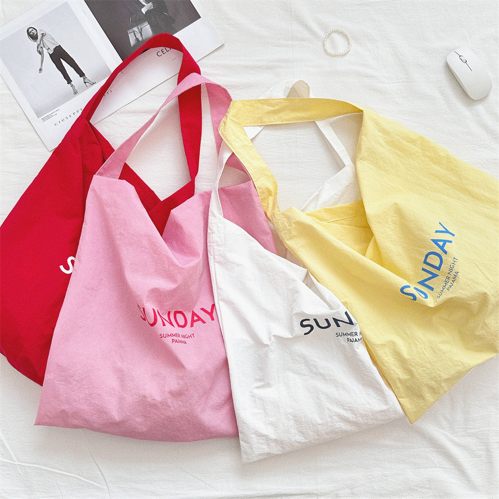 47271 New niche letter-printed single-shoulder bag, large-capacity commuting fabric bag, women's canvas bag, trendy shopping bag full figure