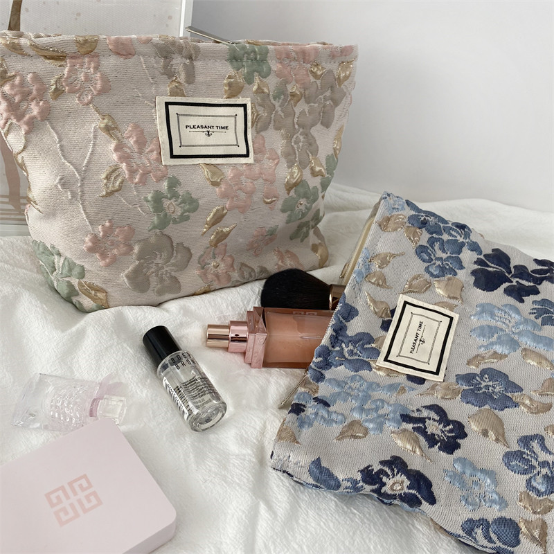 18241 French embossed flower cosmetic bag, simple large-capacity portable handbag, casual mobile phone, walking clutch details Picture