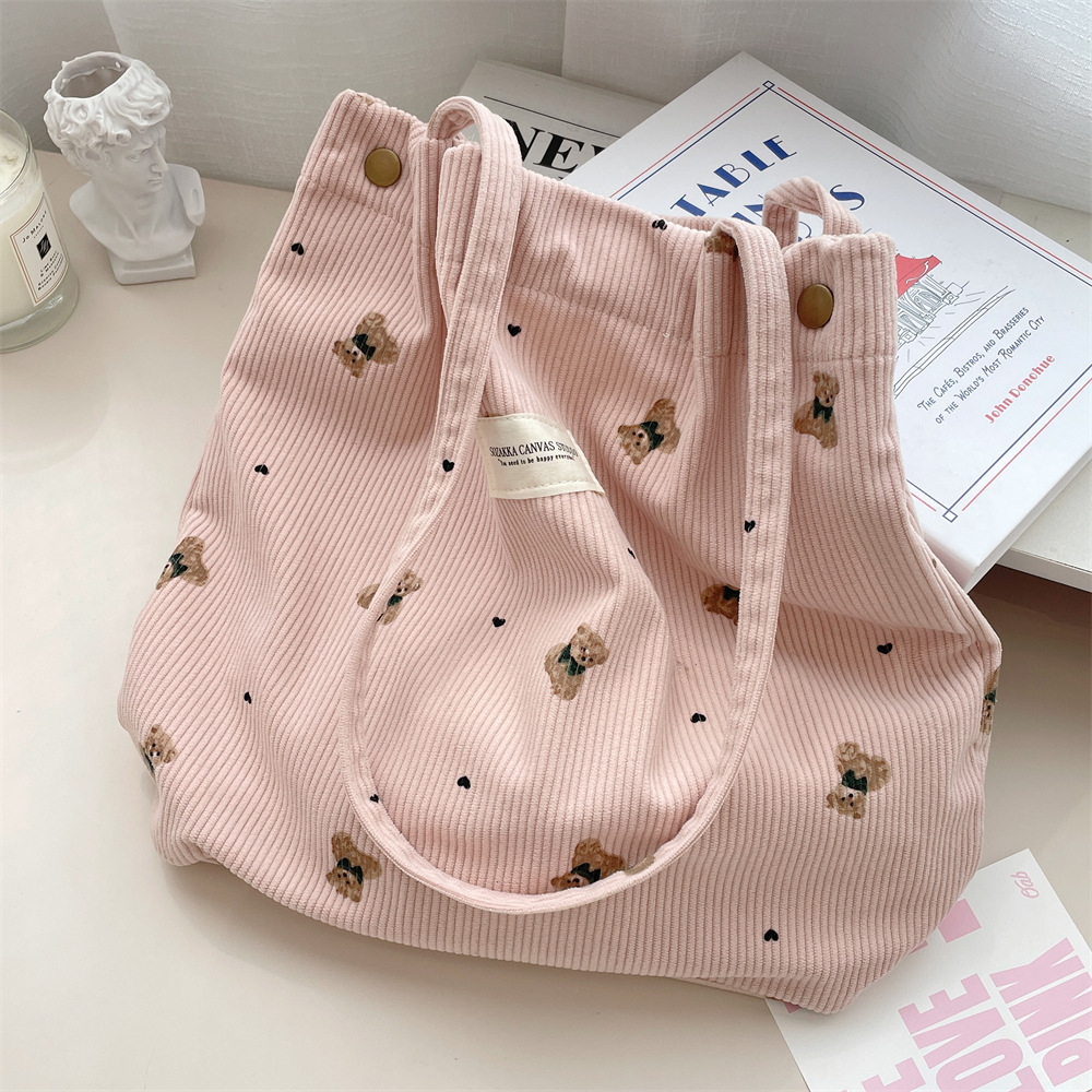 49193 copyrighted corduroy cartoon printed bear large capacity hand-held shoulder bag, student class armpit bag Application Scenario