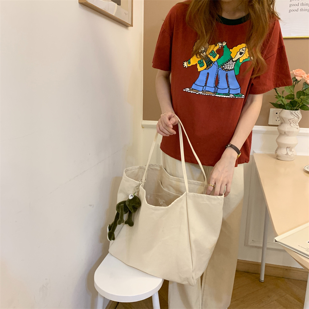 K44 dual-purpose solid color large-capacity tote bag, retro canvas bag, outdoor handbag, student single-shoulder schoolbag full figure