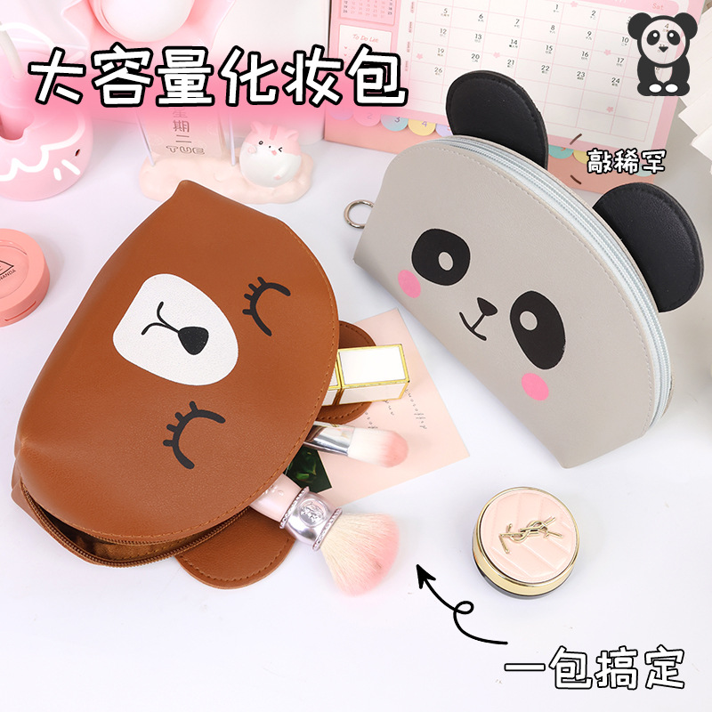 A new cartoon large-capacity ins hand-held toiletries and storage bag for women. It is portable and has a high level of appearance when going out full figure