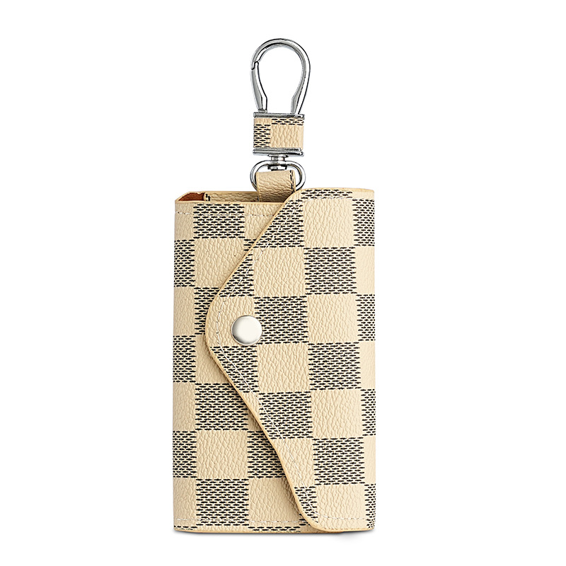 A unisex car key case for both men and women, a creative, fashionable and simple household key storage case with a keychain hanging decoration Item Picture