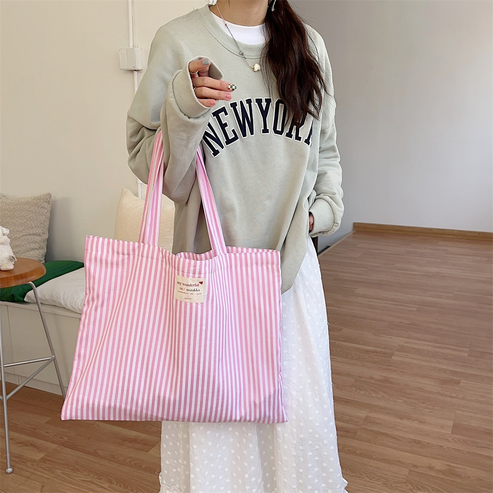 43201 striped color-blocking fresh canvas bag, large-capacity class commuting bag, high appearance level single-shoulder tote bag details Picture