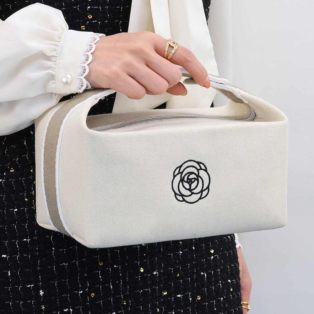Portable canvas handbag, makeup bag, new high-end camellia lipstick, mobile phone, watch, key, travel storage full figure