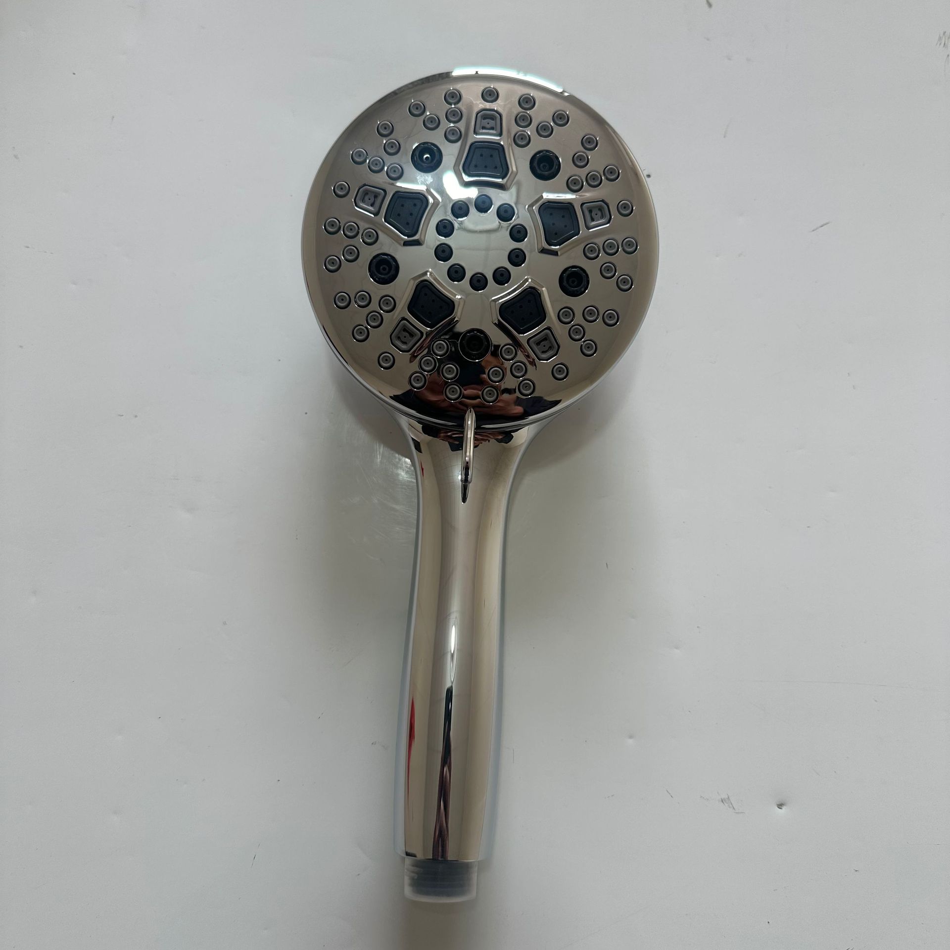 Fully electroplated 9-function hand-held showerhead with a spray gun at the back. High-quality hand-held showerhead from Cixi full figure