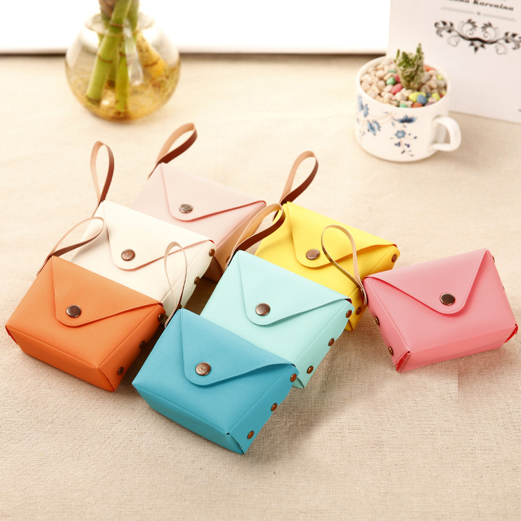 Korean cute candy-colored small coin purse, coin case, key case, creative macaron hand-held small bag Application Scenario