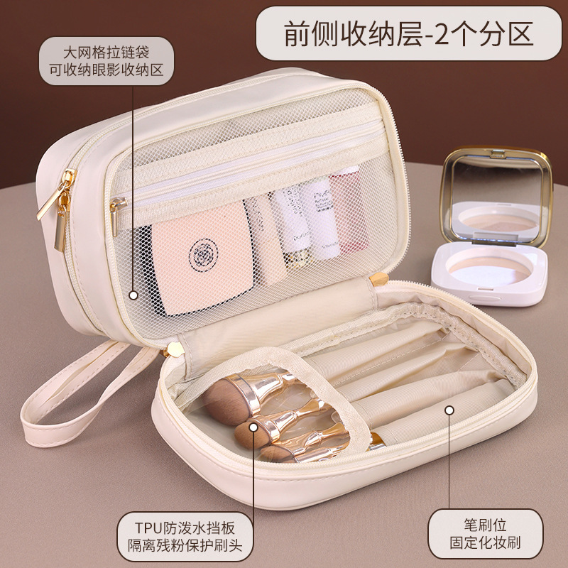 The new cross-border double-layer Starlight Beauty pu makeup bag features a large capacity and a high-end feel. It is a portable hand-held makeup brush storage bag details Picture
