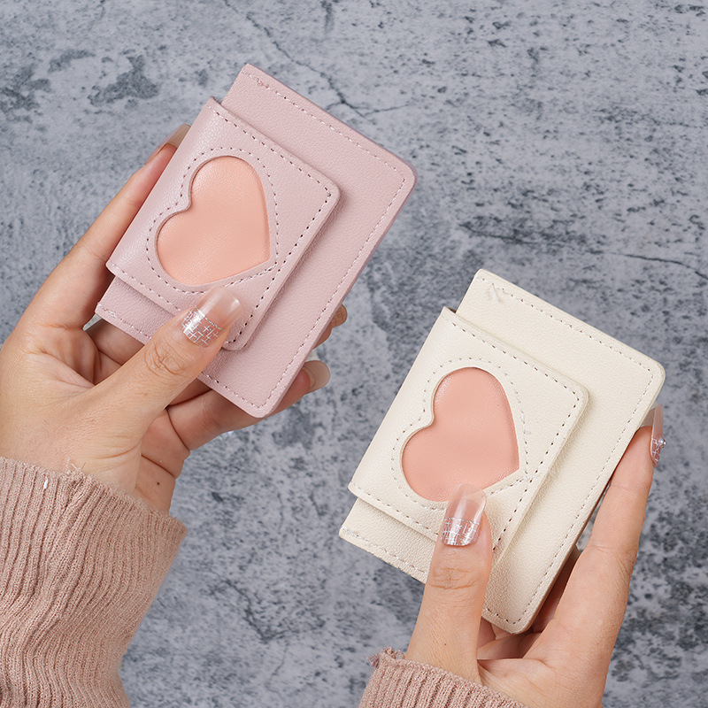 Minwei's new Instagram-style Korean version heart-shaped embossed short macaron color women's coin purse Application Scenario