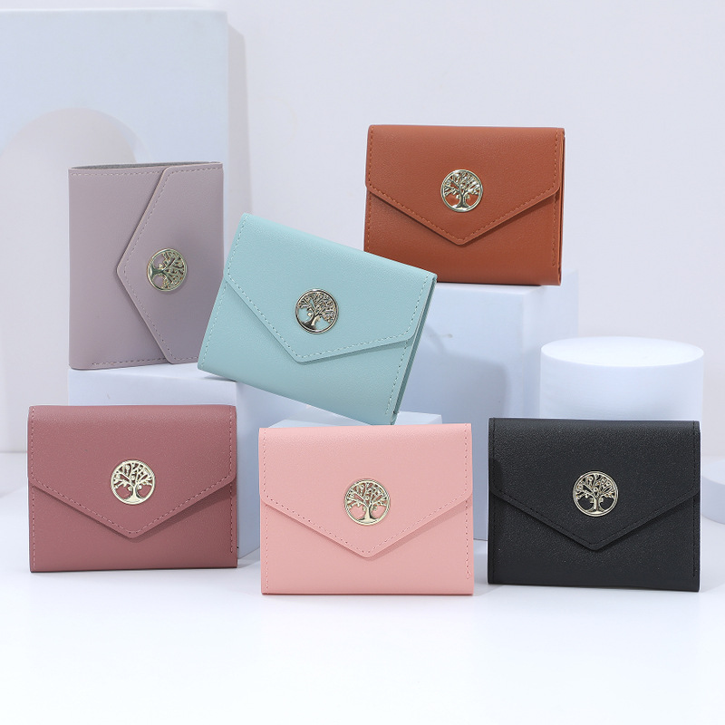 New style wallet, short and fashionable Korean hand-held bag for female junior high school students, solid color, versatile wallet wholesale, creative full figure