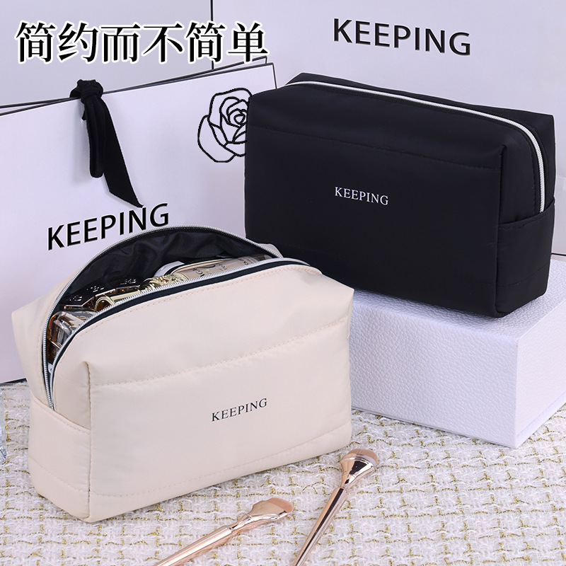 Simple, light luxury and high-end women's portable small-sized hand-held makeup bag, high appearance level travel toiletries and cosmetics storage bag details Picture