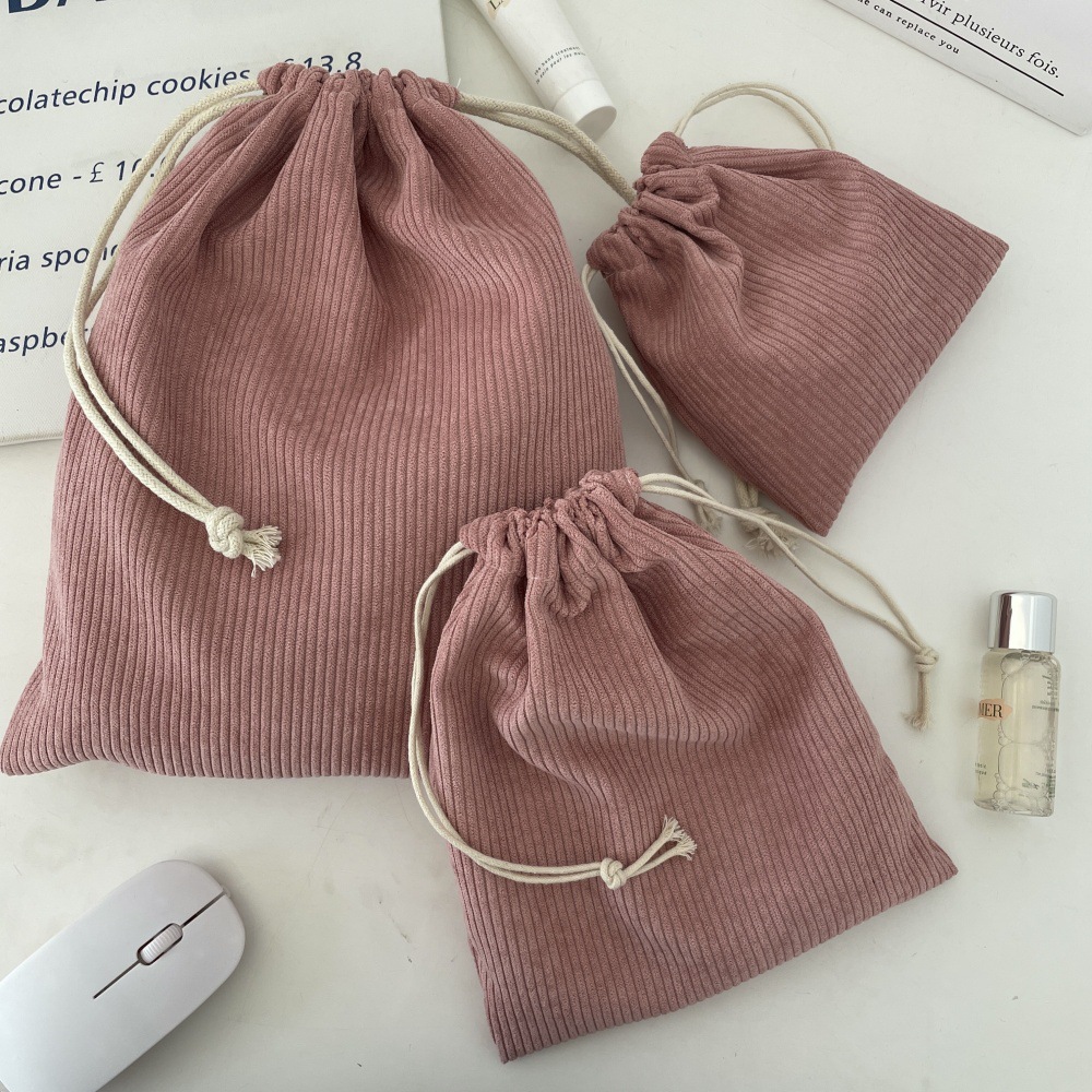 410168 Corduroy solid color storage blank style drawstring closure cosmetic bag, portable large capacity three-piece set for women Application Scenario