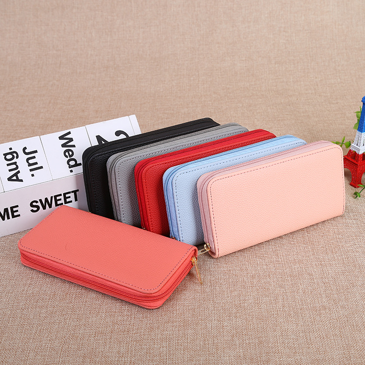 Ladies' long solid-color wallet, new fashionable mobile phone bag, large-capacity loose change, zipper clutch wholesale full figure