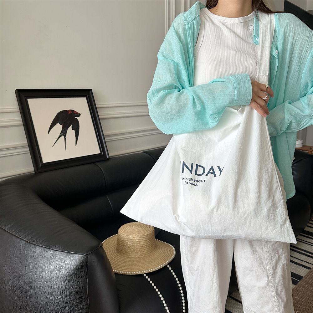 47271 New niche letter-printed single-shoulder bag, large-capacity commuting fabric bag, women's canvas bag, trendy shopping bag Specification drawing