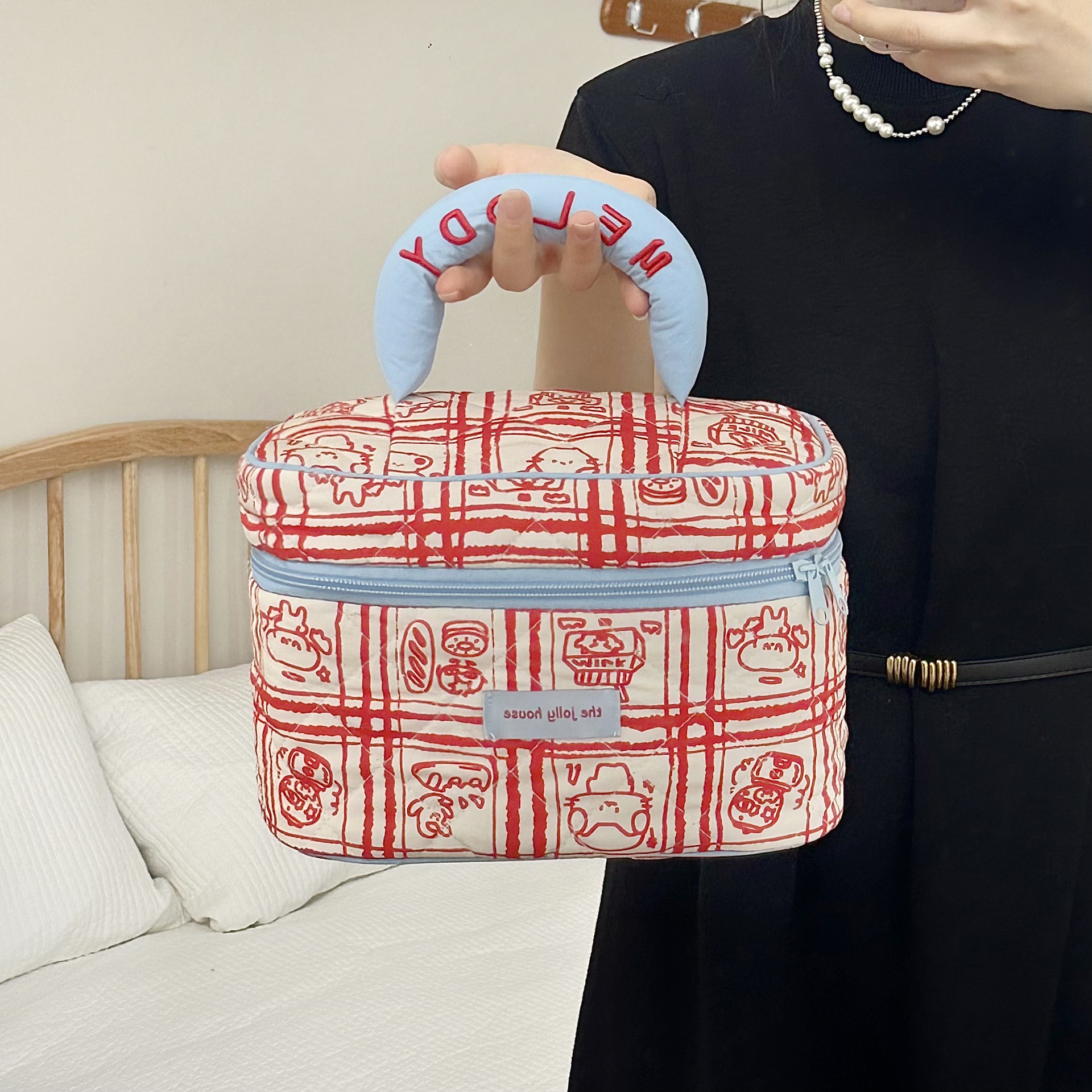 Red checkered cartoon storage bag, makeup bag, large-capacity hand-held toiletry bag for women, portable skin care product storage bag for going out Application Scenario