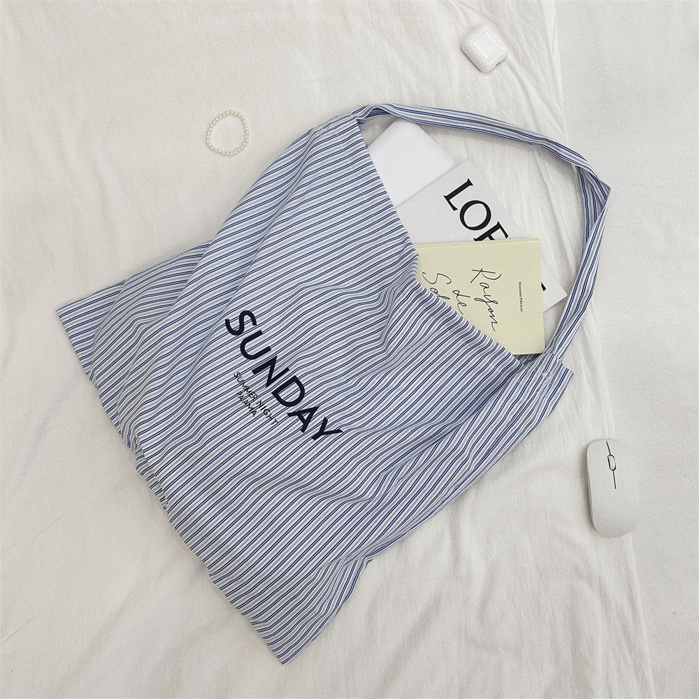 47271 Summer Letter blue and white striped canvas bag, casual and laid-back style, large-capacity single-shoulder crossbody underarm bag details Picture