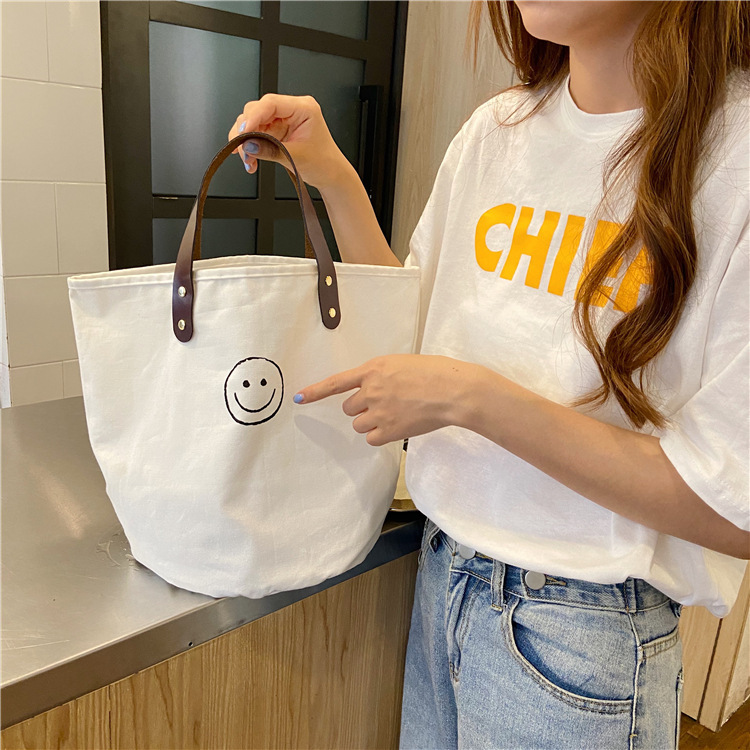 0542 ins French retro polka dot hand-held canvas bag, lunch box, hand-held bucket bag for women Specification drawing