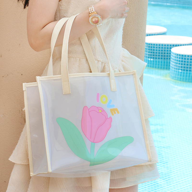 Summer jelly beach bag for women, transparent hand-held bag, PVC storage bag, niche portable handbag, single-shoulder bag full figure