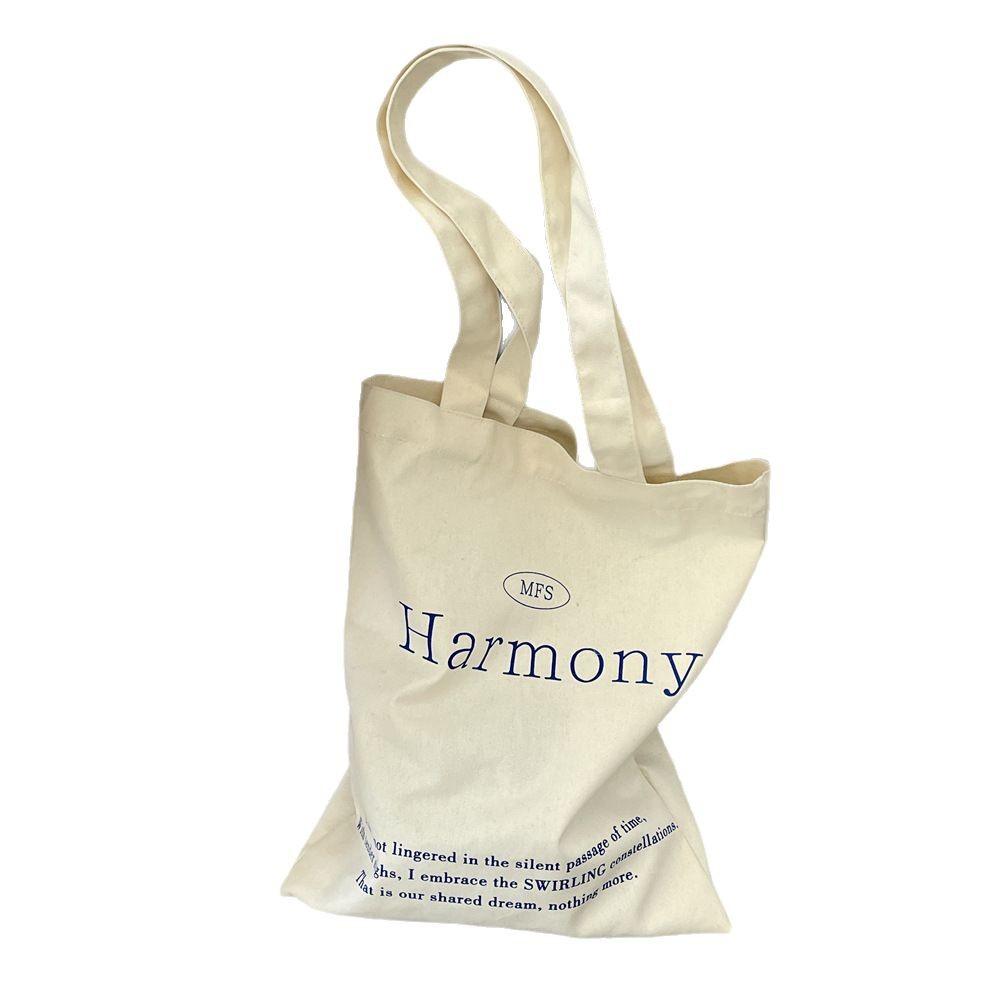 53223 Korean Instagram niche canvas bag, large capacity solid color letter printed shopping cloth bag, hand-held women's bag Item Picture