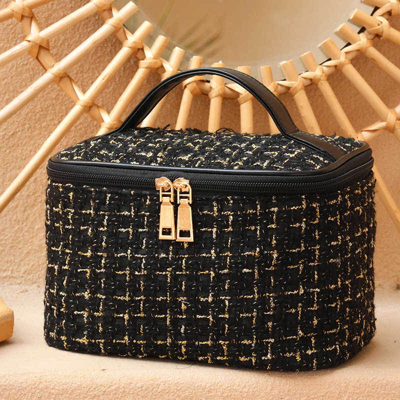 Wholesale new women's makeup bag, small chanel-style, large-capacity ins hand-held toiletries and storage bag, portable for going out, high appearance level full figure