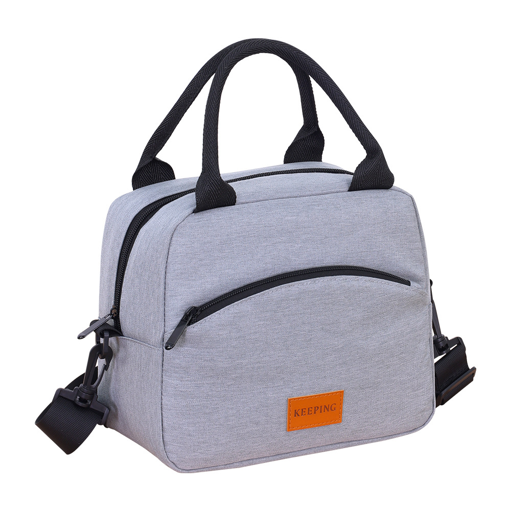 The new cross-border hand-held lunch box bag can be carried diagonally. It is waterproof, oil-proof and heat-insulating. It is a large-capacity lunch box bag for office workers with rice Item Picture