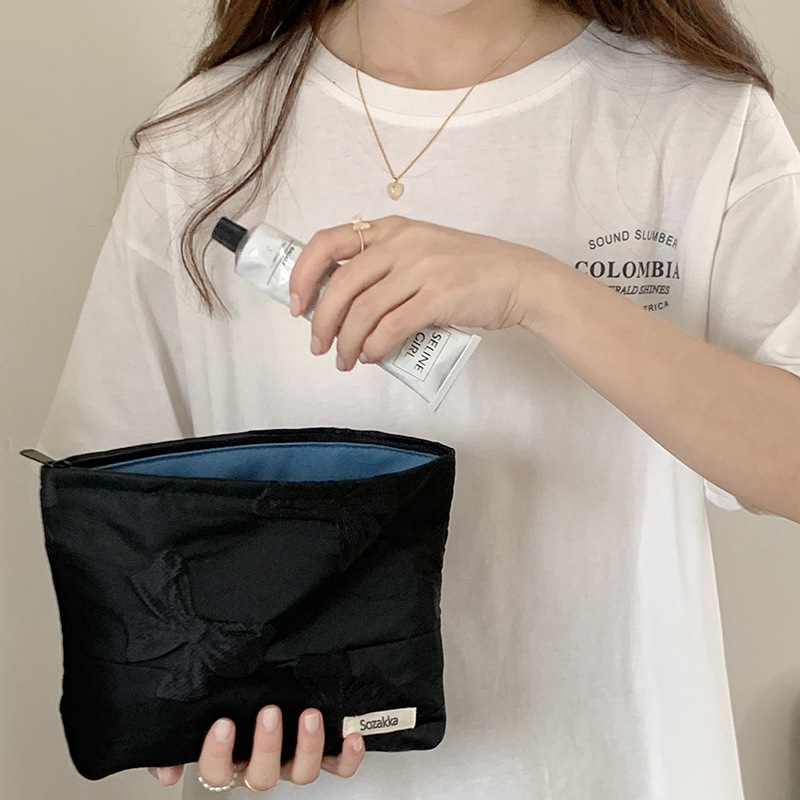 111121 Korean dark-patterned butterfly cosmetic bag, portable storage bag, zipper women's bag, coin purse, shopping and walking bag details Picture