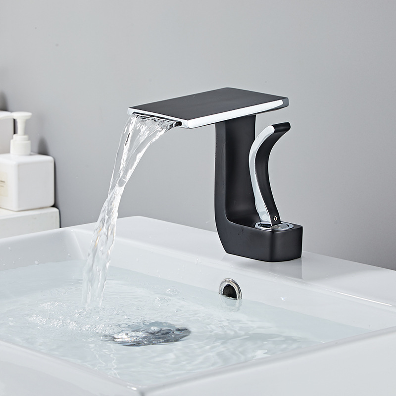 The manufacturer supplies new types of washbasins, hot and cold water faucets, copper body, waterfall water outlet, bathroom washbasins, single-hole bathroom products for wholesale Specification drawing