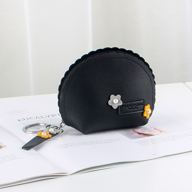 The cute girl Douyin hand-held coin purse is small and simple, featuring a coin key case with an integrated zipper and waterproof design details Picture