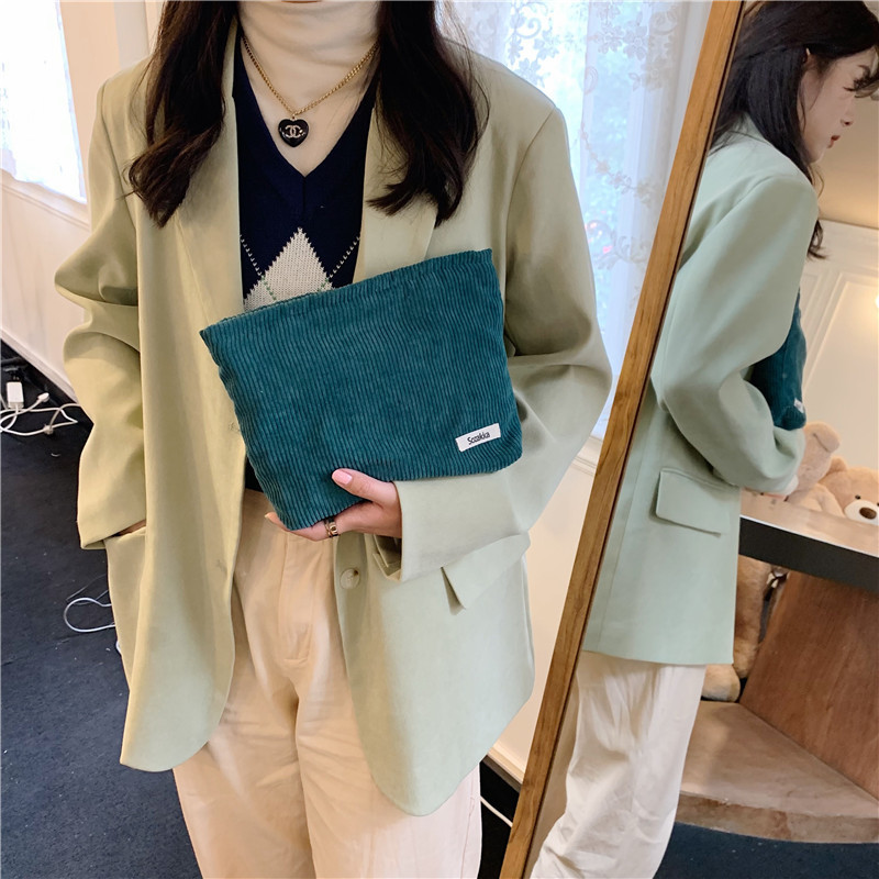 13161 Corduroy makeup bag for women, large-capacity lipstick touch-up, loose change, mobile phone, portable hand-held bag, solid color storage Application Scenario