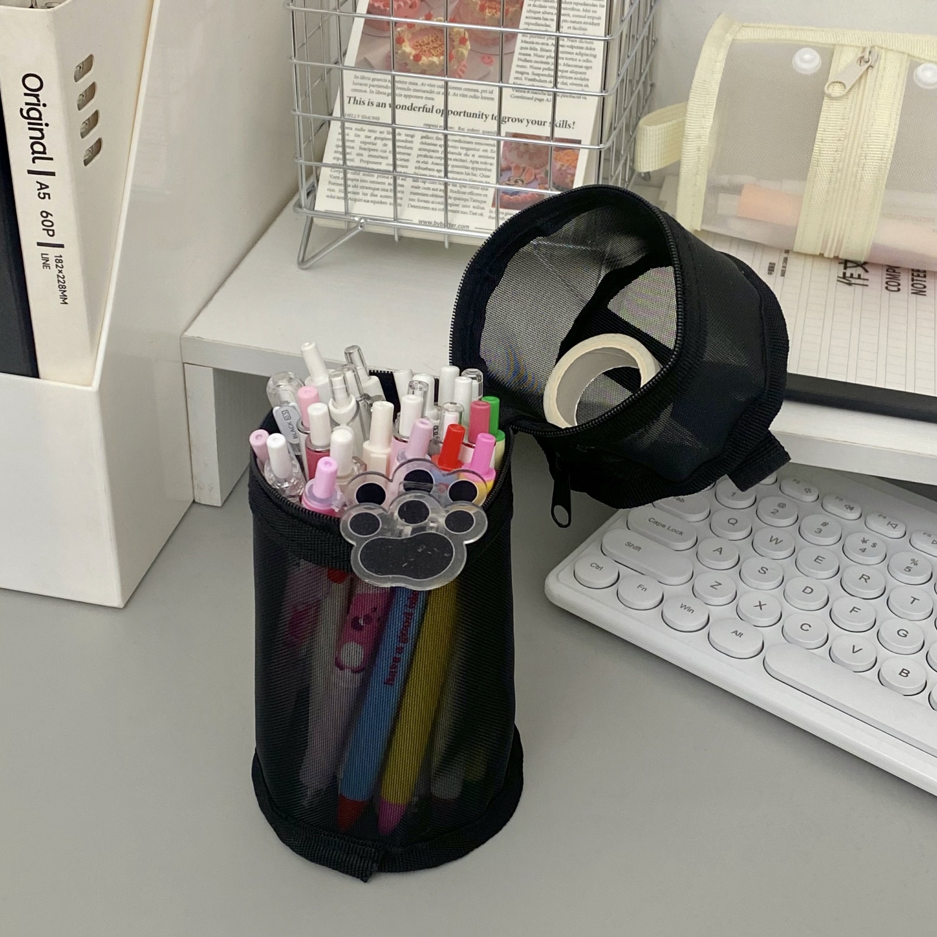 Simple pen holder and pen case, ins high appearance level cylindrical pencil case, student large capacity transparent mesh storage stationery box Application Scenario