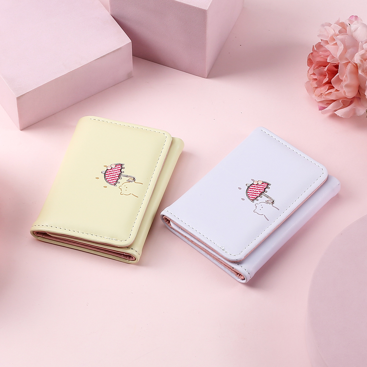 A new short wallet for women from Ailun, featuring cute Japanese and Korean cartoon umbrellas, a card holder with a snap button, and a simple 30% off coin purse full figure