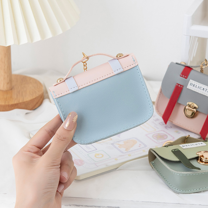 Wholesale of cute female creative mini and small wallets, lid-style lock coin cases, keychains, pendants, and small wallets Specification drawing