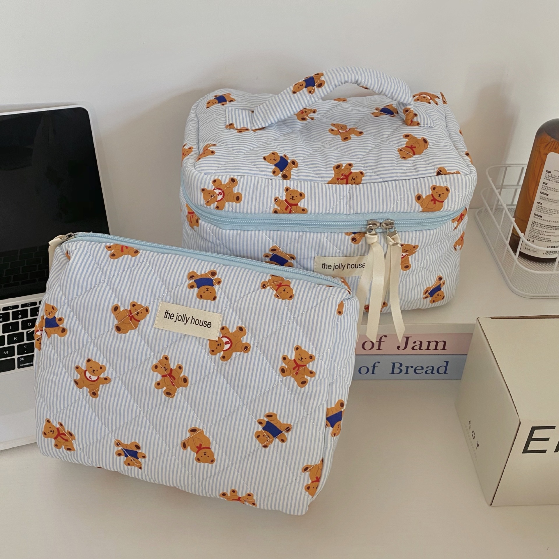 Cross-border blue striped bear makeup bag, large-capacity, high-end portable cosmetics storage bag, storage bag details Picture