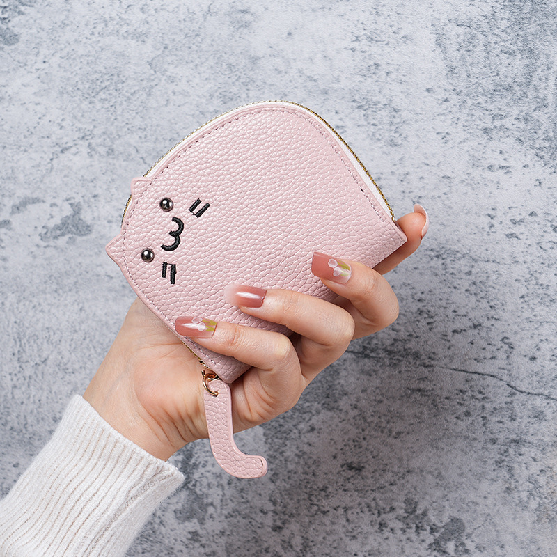 The 2023 new cat-shaped card case for ladies is a compact, trendy, cute, multi-slot, high-end cartoon coin purse that is both portable and adorable full figure