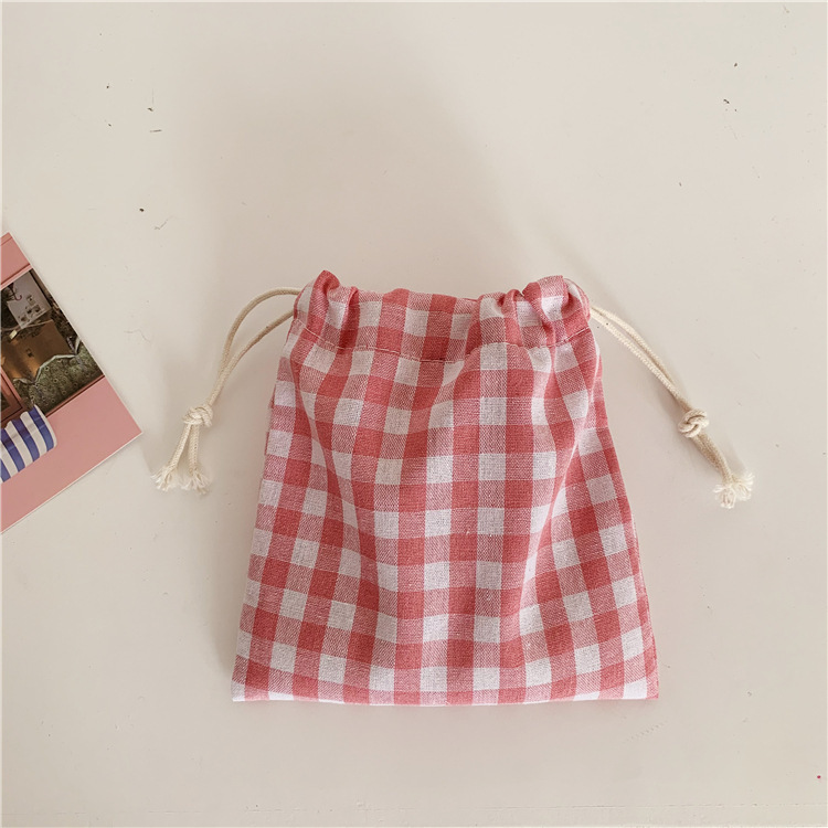 Wholesale of 07213 fresh and simple large square cotton and linen drawstring bags for candy and tea storage Application Scenario