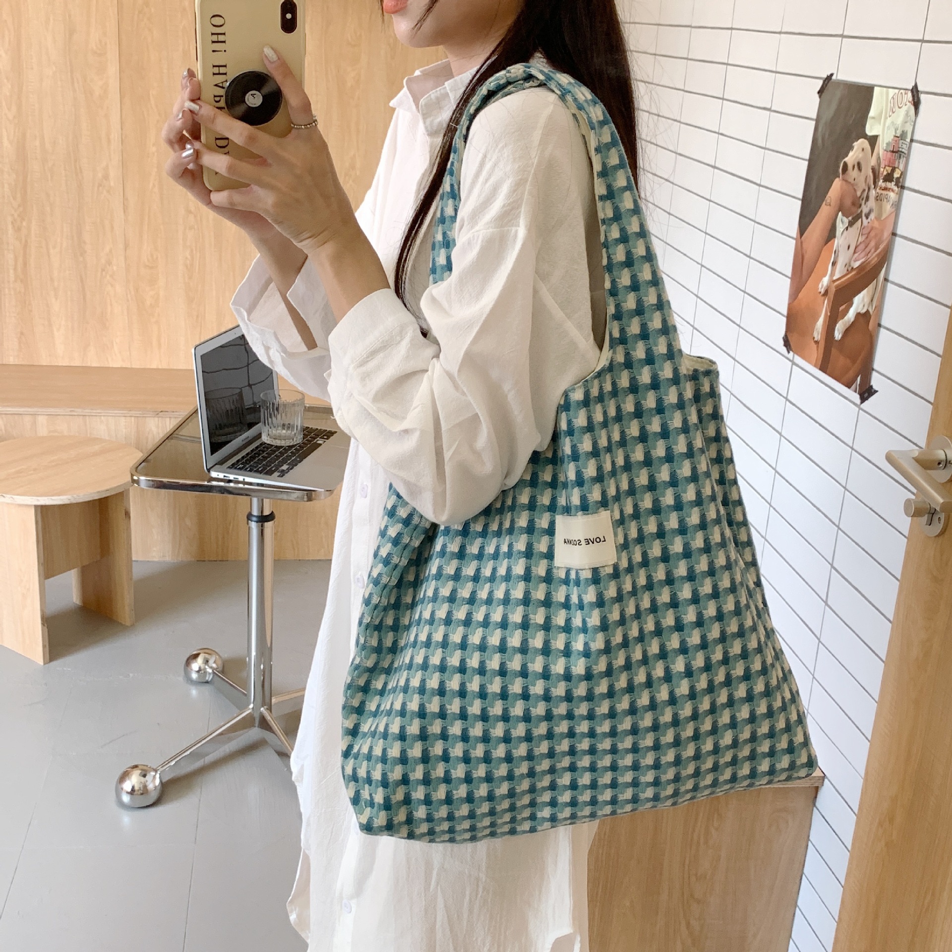 28161 Korean version refreshing lake blue vest bag, fashionable checked woven hand-held shoulder bag, student class cloth bag details Picture