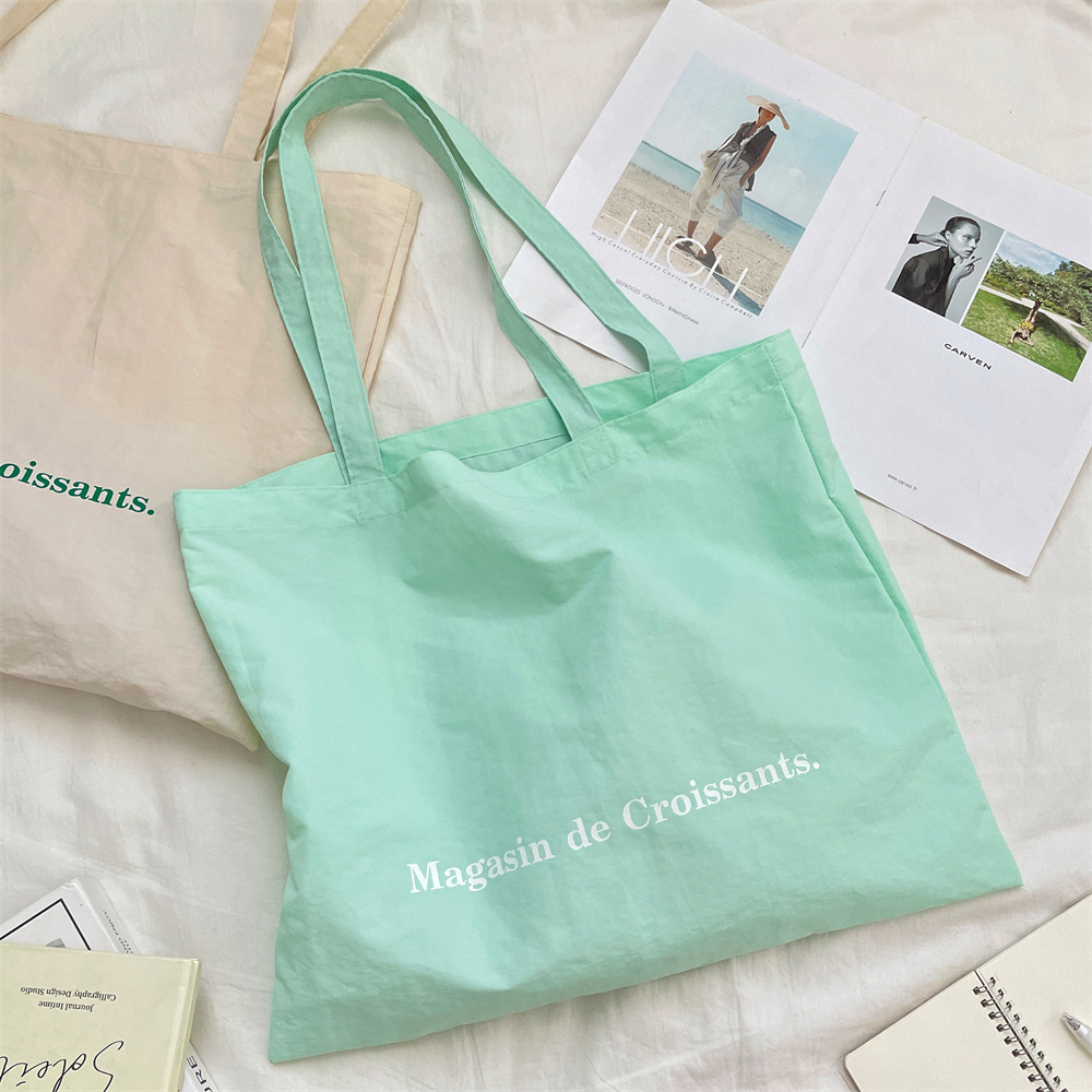 56181 large-capacity canvas tote bag for girls, single-shoulder bag for students' classes, printed fabric bag, simple schoolbag Application Scenario