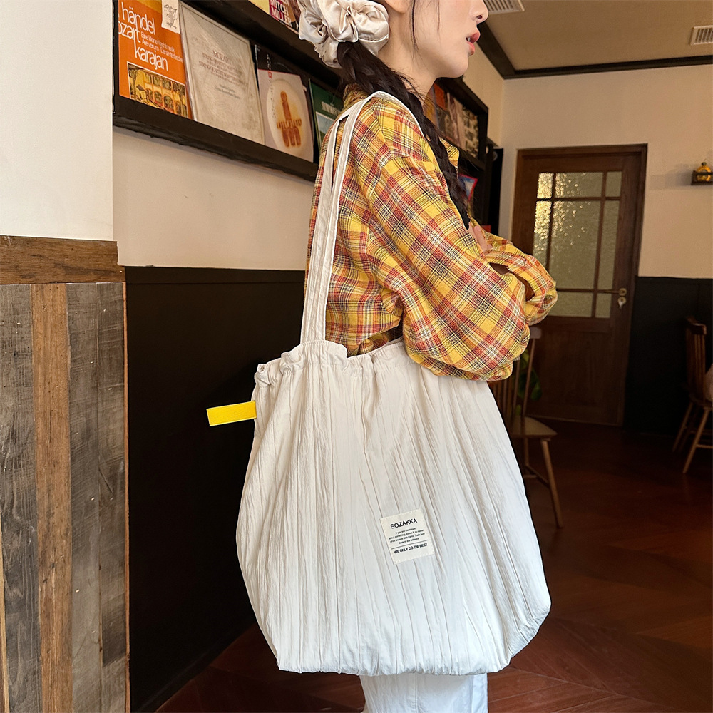 New 4941 striped drawstring single-shoulder bag, laid-back style tote fabric bag, large capacity commuter bag, student class bag Specification drawing