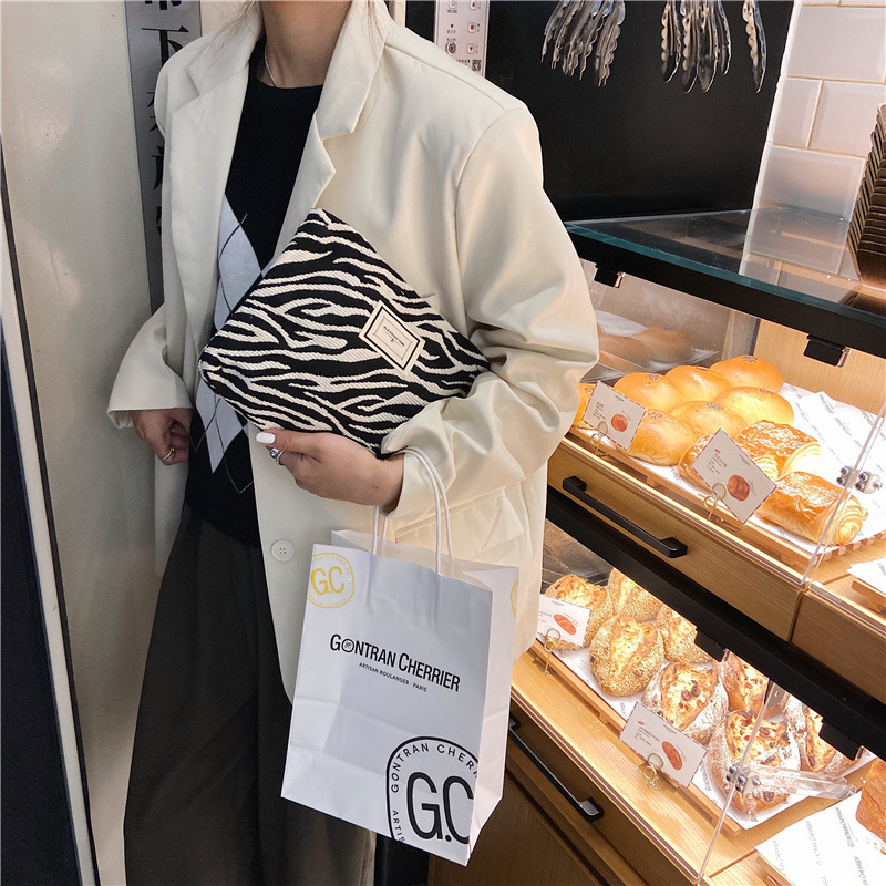 13314 Korean fashion leopard print and spotted print cosmetic bags, women's clutch bags, canvas convenient toiletry and storage bags wholesale details Picture
