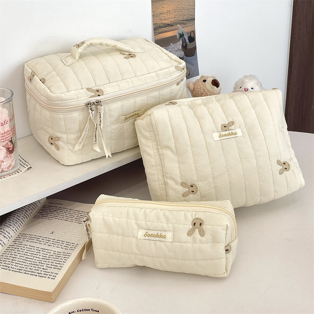 412222 Soft and cute embroidered little rabbit quilted soft storage bag, large capacity makeup bag, student stationery bag Application Scenario