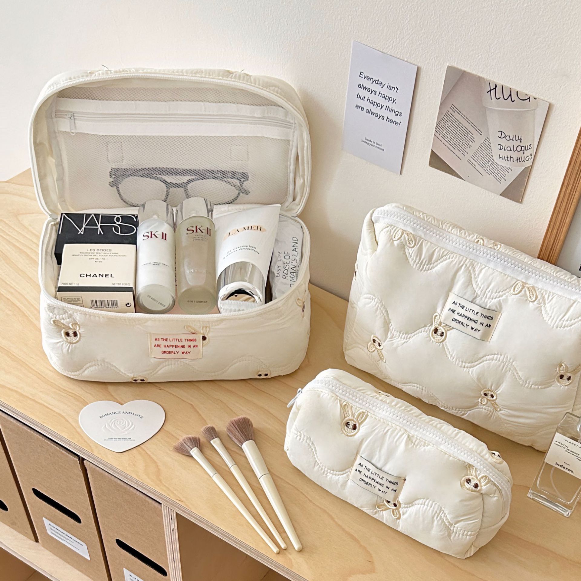 Cute embroidered rabbit makeup bag, ins style, simple and large-capacity travel cosmetics toiletry bag, storage bag for women Application Scenario