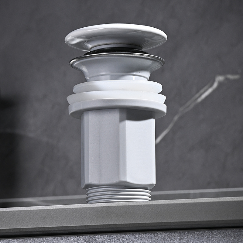 Washbasin ceramic cover drainage wonder, washbasin drainage pipe, anti-odor drain, washbasin, countertop and sink set Application Scenario