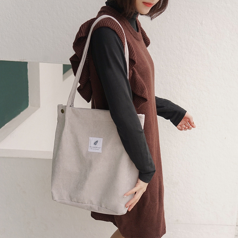 J10 Wholesale Korean version corduroy four-button women's bag, large capacity artistic single-shoulder bag, student shopping bag for women details Picture