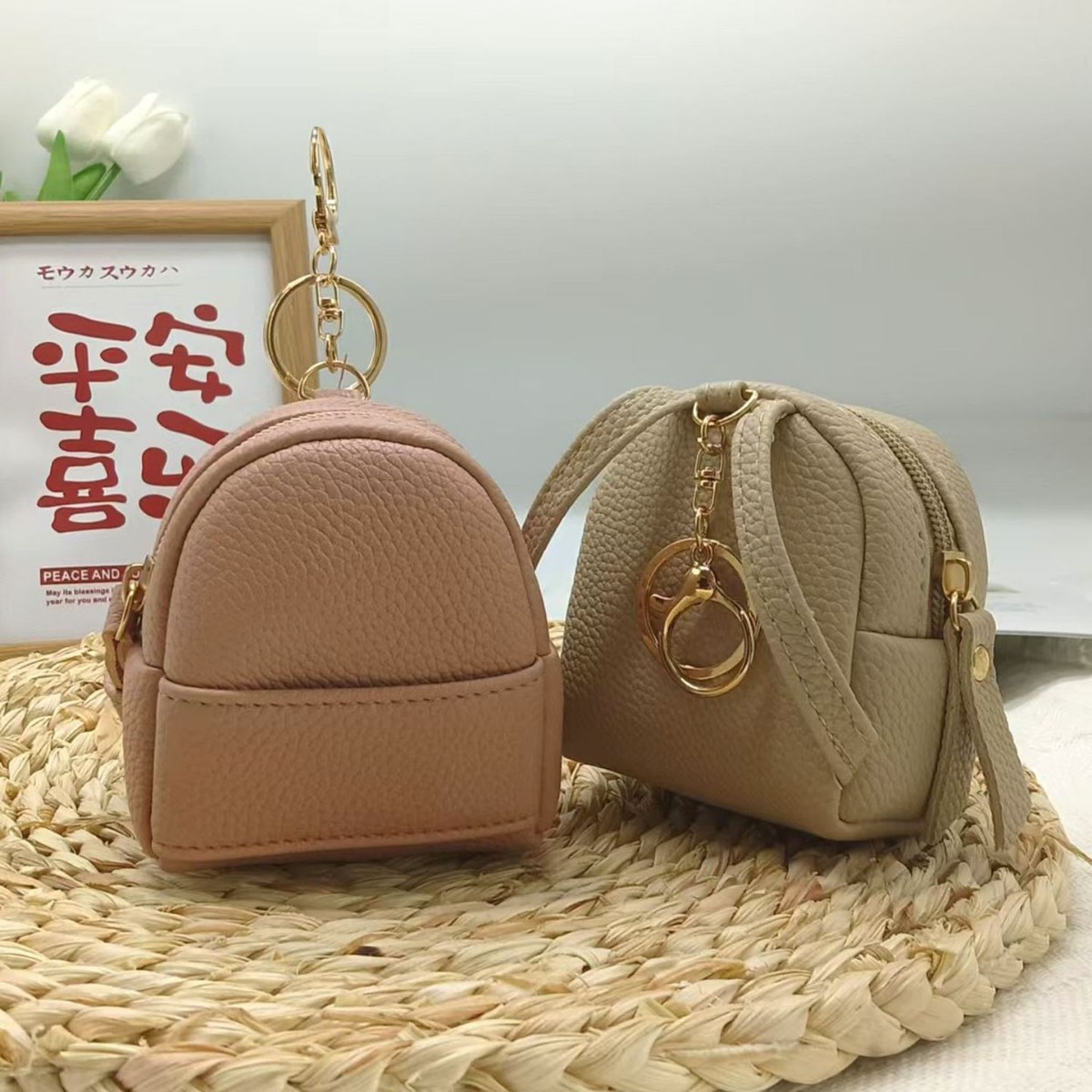 2024 New lychee-patterned small backpack keychain mini portable storage wireless headphones, loose change full figure