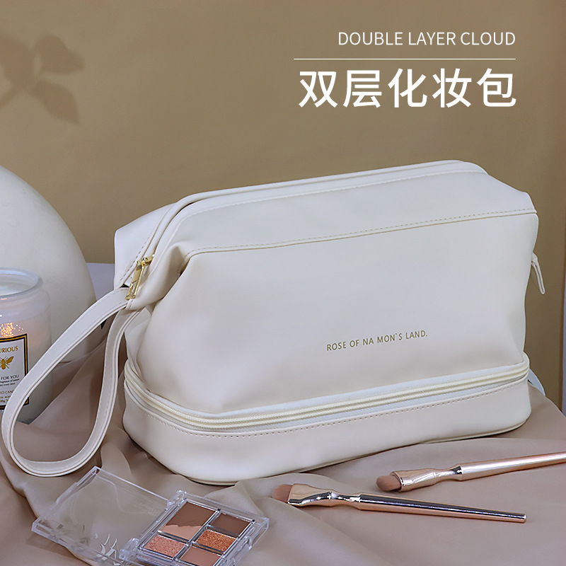 Wholesale of Cloud Double-layer large-capacity high-appearation-level cosmetic bags for men and women, portable travel toiletries and storage bags for men and women full figure