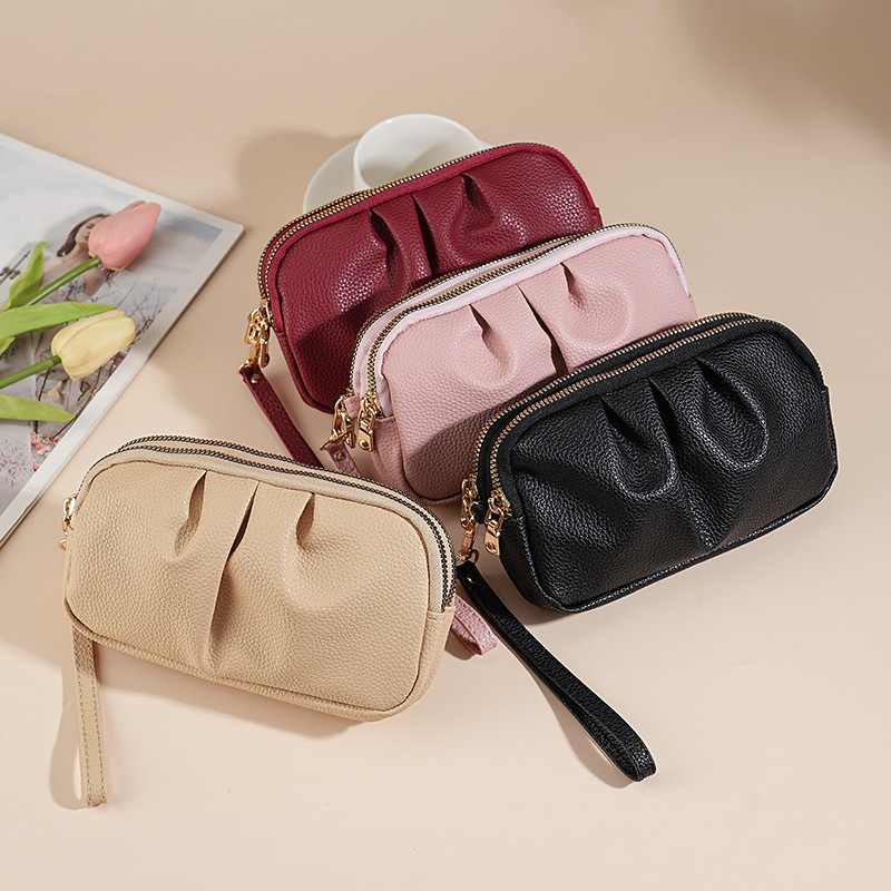 A PU leather hand-held bag for women, a double-layer large-capacity, elegant women's wallet, a mobile phone case, and a light luxury style full figure