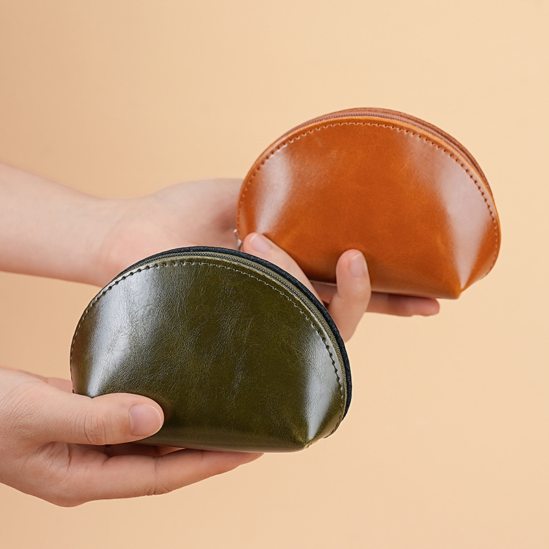 A modern and simple new pu coin purse with a small and high-end feel, a zipper key case for women, and a storage bag for outdoor travel full figure