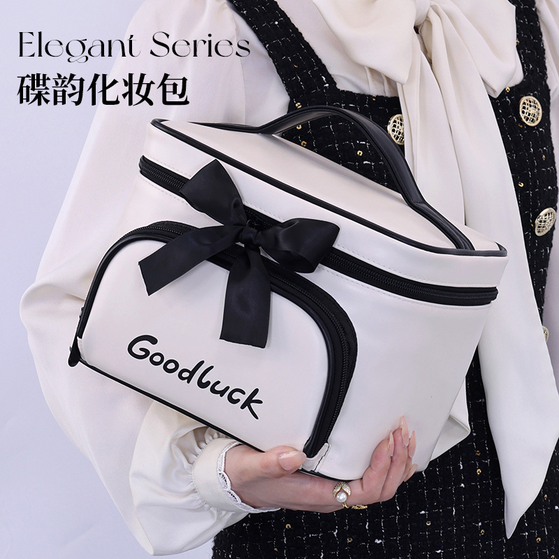 The new cross-border product, Butterfly Charm Makeup Bag, features a large capacity and a high-end feel. It is a small fragrance style hand-held cosmetics storage bag and a toiletries bag full figure